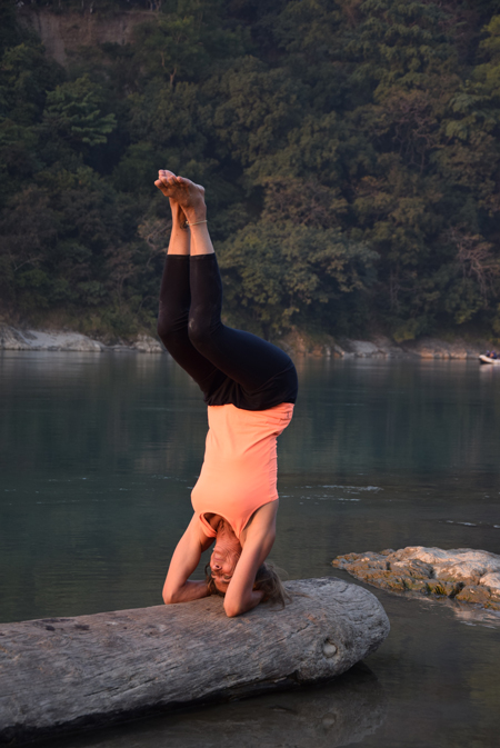 yoga practice on river bank