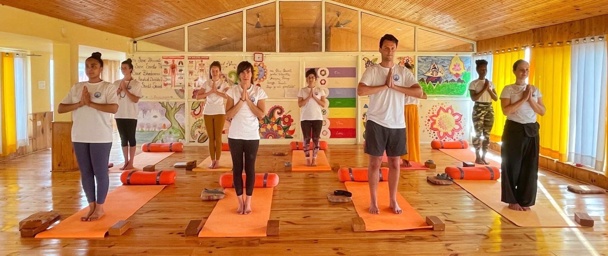 student performing yoga at yoga india foundation