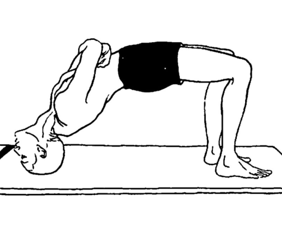 Advanced yoga student balancing in Grivasana neck pose with crossed arms